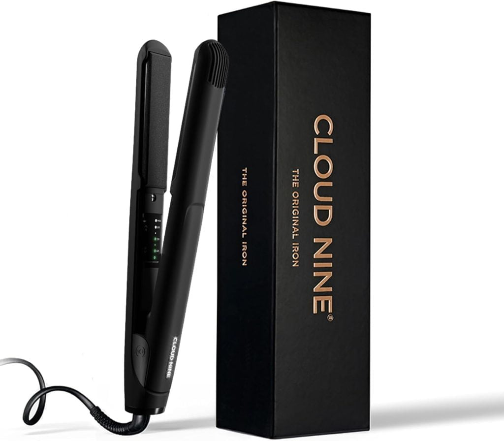 A "Cloud Nine" flat iron hair straightener with its box.
