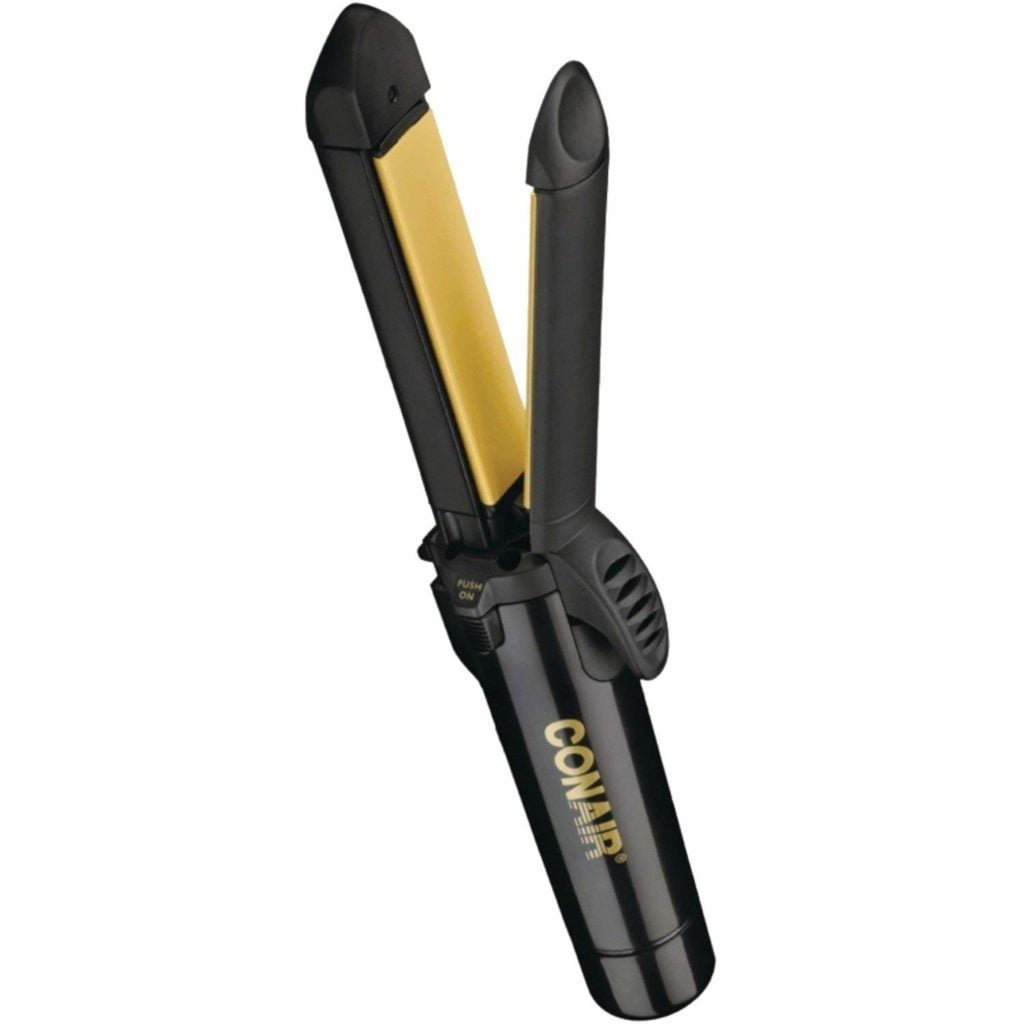 A black and gold flat iron, featuring a compact design.