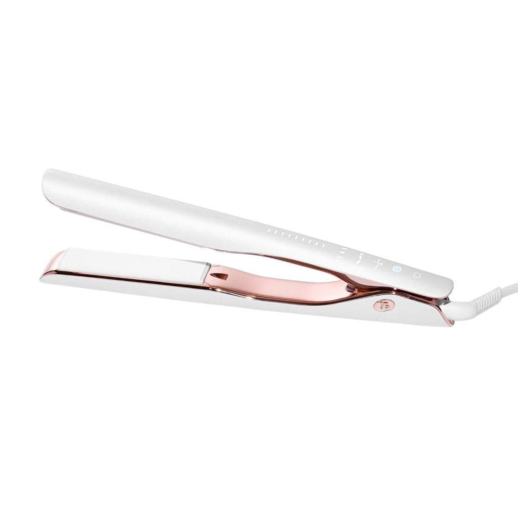 A white and rose gold flat iron with a sleek design.